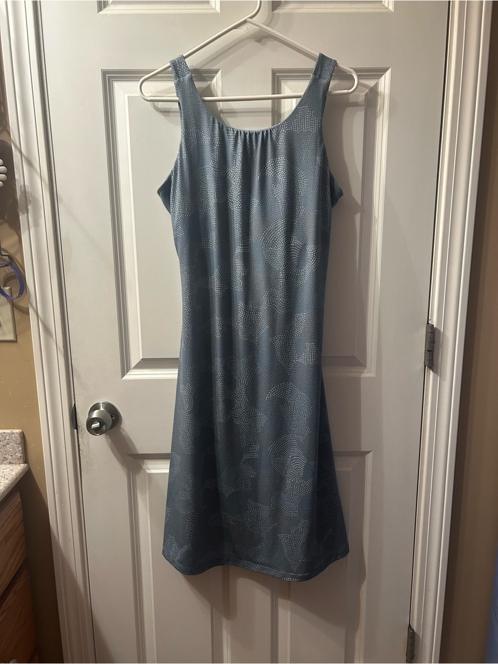 Prana large twist open back dress slate background w/colored dot pattern